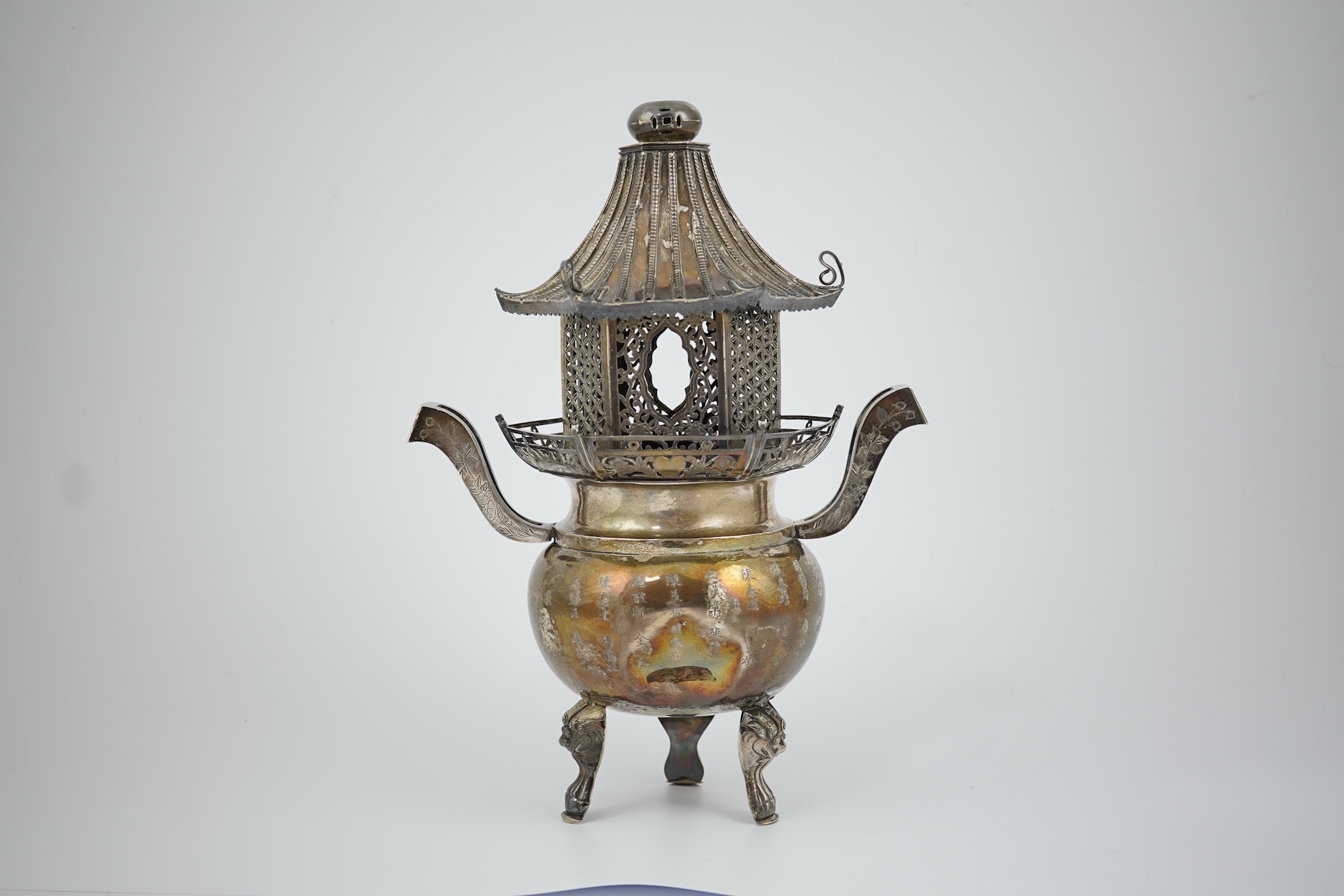 An unusual Chinese silver tripod censer with pagoda shaped cover, ding, early 20th century